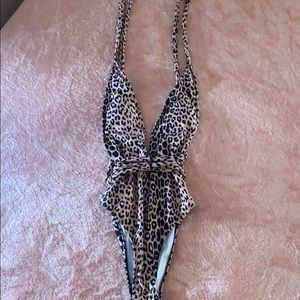 One piece deep cut bathing suit